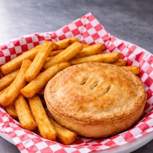 A photo of a butter chicken pie.