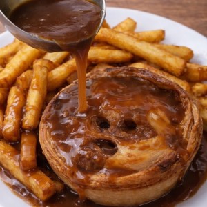 A photo of a steak and Guinness pie.