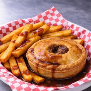A photo of a steak and kidney pie.